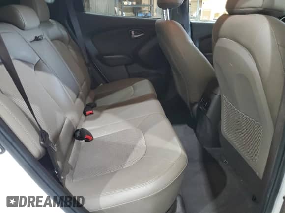 2014 Hyundai Tucson Limited with VIN KM8JUCAG2EU806309, listed as a Copart auction lot 66015735 with 104,328 mi miles and Salvage title. Bid and sale history available at DreamBid. Image 11.