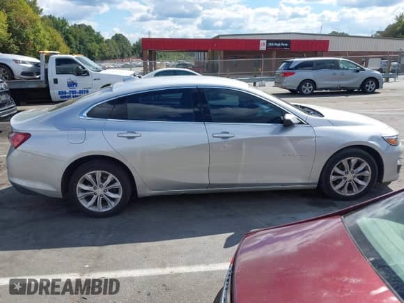 2020 Chevrolet Malibu LT with VIN 1G1ZD5ST7LF007697, listed as a IAAI auction lot 43251134 with 138,518 mi miles and . Bid and sale history available at DreamBid. Image 13.