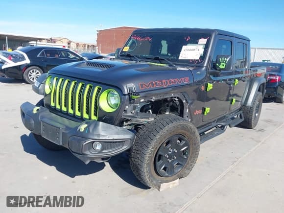 ✅ 2023 Jeep Gladiator Mojave • VIN: 1C6JJTEGXPL517914 • Lot: 43666074. Listed on IAAI with 33,445 mi. Free auction sales archive from the USA and detailed vehicle history report at DreamBid. Image 2.