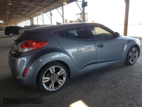 2015 Hyundai Veloster z VIN KMHTC6AD1FU232550, wystawiony jako Copart lot #69808314 z przebiegiem 97 915 mil mil oraz Szkoda całkowita • Salvage title. Historia ofert i sprzedaży dostępna na DreamBid. Obrazek 3.