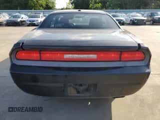 2014 Dodge Challenger R/T Plus z VIN 2C3CDYBT7EH282216, wystawiony jako Copart lot #58225774 z przebiegiem 257 947 mil mil oraz Szkoda całkowita • Salvage title. Historia ofert i sprzedaży dostępna na DreamBid. Obrazek 6.