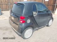 ✅ 2009 Smart fortwo Pure • VIN: WMEEJ31X59K312270 • Lot: 41910686. Listed on IAAI with 111,107 mi. Free auction sales archive from the USA and detailed vehicle history report at DreamBid. Image 4.