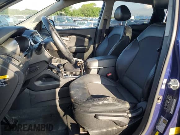 2011 Hyundai Tucson GLS z VIN KM8JUCAC4BU174888, wystawiony jako Copart lot #63278655 z przebiegiem 156 034 mil mil oraz Szkoda całkowita • Salvage title. Historia ofert i sprzedaży dostępna na DreamBid. Obrazek 7.