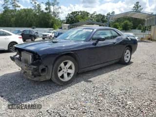 2012 Dodge Challenger SXT with VIN 2C3CDYAG1CH254378, listed as a Copart auction lot 68018935 with 211,354 mi miles and Salvage title. Bid and sale history available at DreamBid. Image 1.