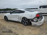 ✅ 2015 Ford Mustang V6 • VIN: 1FA6P8AM7F5315272 • Lot: 84479565. Listed on Copart with 130,157 mi. Free auction sales archive from the USA and detailed vehicle history report at DreamBid. Image 2.