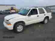 2002 Chevrolet Blazer LS z VIN 1GNDT13W12K169005, wystawiony jako Copart lot #84643884 z przebiegiem Nie podano mil oraz Szkoda całkowita • Salvage title. Historia ofert i sprzedaży dostępna na DreamBid. Obrazek 1.