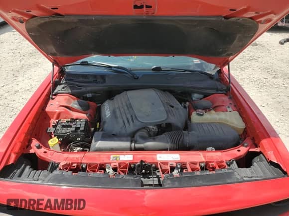 2015 Dodge Challenger R/T z VIN 2C3CDZAT4FH712793, wystawiony jako Copart lot #69822155 z przebiegiem Nie podano mil oraz Szkoda całkowita • Salvage title. Historia ofert i sprzedaży dostępna na DreamBid. Obrazek 11.