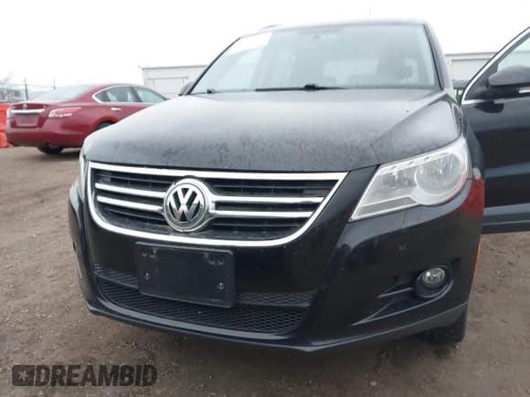 ✅ 2011 Volkswagen Tiguan S • VIN: WVGBV7AX1BW521660 • Lot: 43797872. Listed on IAAI with 143,107 mi. Free auction sales archive from the USA and detailed vehicle history report at DreamBid. Image 6.