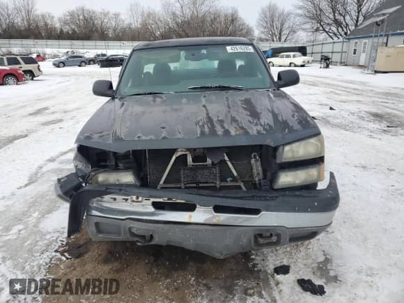 2004 Chevrolet Silverado 1500 LS z VIN 1GCEC14T14E188690, wystawiony jako Copart lot #42616285 z przebiegiem 186 116 mil mil oraz Czysty tytuł • Clean title. Historia ofert i sprzedaży dostępna na DreamBid. Obrazek 5.