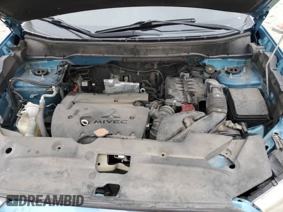 2013 Mitsubishi Outlander SE with VIN 4A4AR4AU7DE006169, listed as a Copart auction lot 71701745 with 154,736 mi miles and Salvage title. Bid and sale history available at DreamBid. Image 12.