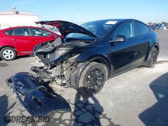 ✅ 2022 Tesla Model Y Long Range • VIN: 7SAYGAEE0NF538282 • Lot: 40826070. Wystawiony na IAAI z przebiegiem 35 231 mil. Bezpłatny archiwum sprzedaży aukcyjnych z USA i szczegółowy raport historii pojazdu na DreamBid. Zdjęcie 2.