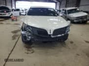 ✅ 2013 Lincoln MKS • VIN: 1LNHL9DK4DG613144 • Lot: 54354625. Listed on Copart with 104,211 mi. Free auction sales archive from the USA and detailed vehicle history report at DreamBid. Image 5.