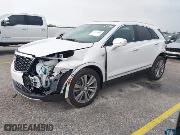 ✅ 2025 Cadillac XT5 AWD Premium Luxury • VIN: 1GYKNDRS9SZ136920 • Лот: 43252861. Опубликован ранее на IAAI с пробегом 10 789 миль. Бесплатный доступ к архиву аукционных продаж из США и подробный отчёт об истории автомобиля на DreamBid. Изображение 2.