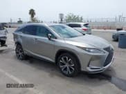 ✅ 2022 Lexus RX 450h • VIN: 2T2HGMDA1NC094391 • Lot: 42540195. Listed on IAAI with 33,328 mi. Free auction sales archive from the USA and detailed vehicle history report at DreamBid. Image 1.