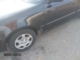 2005 Hyundai Accent GLS z VIN KMHCG45C55U587584, wystawiony jako IAAI lot #42864972 z przebiegiem 122 849 mil mil oraz . Historia ofert i sprzedaży dostępna na DreamBid. Obrazek 6.