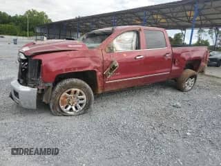 2019 Chevrolet Silverado 2500HD LTZ z VIN 1GC1KTEY0KF197895, wystawiony jako Copart lot #65482015 z przebiegiem Nie podano mil oraz Szkoda całkowita • Salvage title. Historia ofert i sprzedaży dostępna na DreamBid. Obrazek 1.