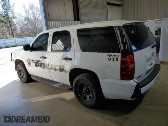 ✅ 2014 Chevrolet Tahoe Commercial • VIN: 1GNLC2E07ER194822 • Lot: 47253625. Listed on Copart with 126,882 mi. Free auction sales archive from the USA and detailed vehicle history report at DreamBid. Image 2.