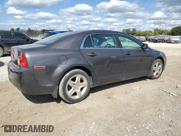 ✅ 2011 Chevrolet Malibu 1LS • VIN: 1G1ZB5E11BF203343 • Lot: 72412874. Listed on Copart with 121,674 mi. Free auction sales archive from the USA and detailed vehicle history report at DreamBid. Image 3.