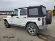 ✅ 2016 Jeep Wrangler Unlimited Sahara • VIN: 1C4HJWEG2GL304531 • Lot: 91180475. Listed on Copart with 86,867 mi. Free auction sales archive from the USA and detailed vehicle history report at DreamBid. Image 2.