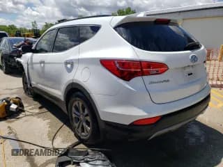 ✅ 2014 Hyundai Santa Fe • VIN: 5XYZU3LB1EG230030 • Лот: 56274614. Опубликован ранее на Copart с пробегом 192 803 миль. Бесплатный доступ к архиву аукционных продаж из США и подробный отчёт об истории автомобиля на DreamBid. Изображение 2.