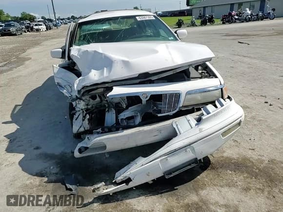 ✅ 1997 Mercury Grand Marquis GS • VIN: 2MELM74W8VX621678 • Лот: 63987365. Опубликован ранее на Copart с пробегом 106 844 миль. Бесплатный доступ к архиву аукционных продаж из США и подробный отчёт об истории автомобиля на DreamBid. Изображение 13.