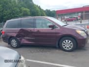 ✅ 2010 Honda Odyssey EX-L • VIN: 5FNRL3H64AB014320 • Lot: 43054071. Listed on IAAI with 159,871 mi. Free auction sales archive from the USA and detailed vehicle history report at DreamBid. Image 13.