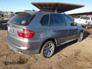 ✅ 2012 BMW X5 35i • VIN: 5UXZV4C57CL764842 • Lot: 43803282. Listed on IAAI with 135,157 mi. Free auction sales archive from the USA and detailed vehicle history report at DreamBid. Image 4.