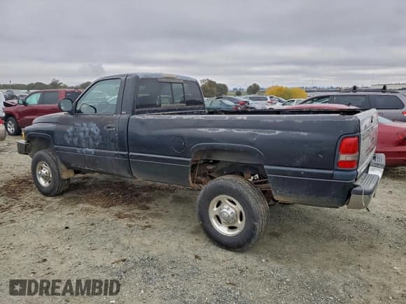 ✅ 2002 Dodge RAM • VIN: 3B7KF26W12M309202 • Lot: 95882175. Listed on Copart with Not provided. Free auction sales archive from the USA and detailed vehicle history report at DreamBid. Image 2.