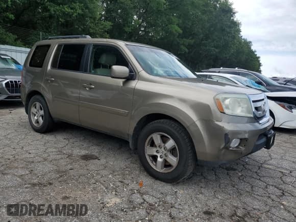 ✅ 2010 Honda Pilot EX-L • VIN: 5FNYF4H50AB039571 • Лот: 60163035. Опубликован ранее на Copart с пробегом 173 443 миль. Бесплатный доступ к архиву аукционных продаж из США и подробный отчёт об истории автомобиля на DreamBid. Изображение 4.