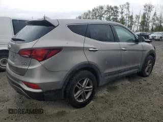 ✅ 2017 Hyundai Santa Fe 2.4L • VIN: 5NMZTDLB6HH002351 • Лот: 52313844. Опубликован ранее на Copart с пробегом Не указан. Бесплатный доступ к архиву аукционных продаж из США и подробный отчёт об истории автомобиля на DreamBid. Изображение 3.