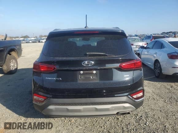 2019 Hyundai Santa Fe SE with VIN 5NMS2CAD2KH008660, listed as a Copart auction lot 89726155 with 76,060 mi miles and Salvage title. Bid and sale history available at DreamBid. Image 6.