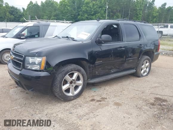 ✅ 2014 Chevrolet Tahoe LT • VIN: 1GNSCBE04ER141927 • Lot: 42651845. Listed on IAAI with 89,980 mi. Free auction sales archive from the USA and detailed vehicle history report at DreamBid. Image 2.