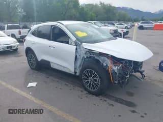 ✅ 2023 Ford Escape PHEV • VIN: 1FMCU0E16PUA43310 • Lot: 42255667. Listed on IAAI with 36,007 mi. Free auction sales archive from the USA and detailed vehicle history report at DreamBid. Image 1.