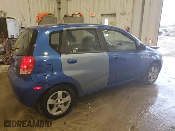 2005 Chevrolet Aveo LS z VIN KL1TD626X5B293852, wystawiony jako Copart lot #86274464 z przebiegiem 150 052 mil mil oraz Nie do naprawy • Non repairable. Historia ofert i sprzedaży dostępna na DreamBid. Obrazek 3.