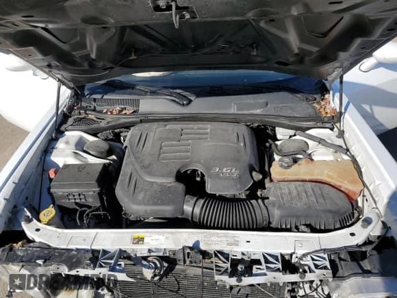 ✅ 2013 Dodge Challenger SXT • VIN: 2C3CDYAG6DH627822 • Lot: 77587304. Wystawiony na Copart z przebiegiem 191 728 mil. Bezpłatny archiwum sprzedaży aukcyjnych z USA i szczegółowy raport historii pojazdu na DreamBid. Zdjęcie 12.