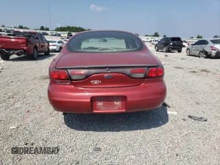 ✅ 1999 Ford Taurus SE • VIN: 1FAFP53U9XA159899 • Lot: 66166594. Listed on Copart with 172,401 mi. Free auction sales archive from the USA and detailed vehicle history report at DreamBid. Image 6.