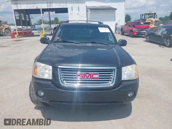 ✅ 2006 GMC Envoy SLE • VIN: 1GKDT13S662184583 • Lot: 42822019. Listed on IAAI with 152,023 mi. Free auction sales archive from the USA and detailed vehicle history report at DreamBid. Image 13.