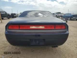 2014 Dodge Challenger SXT z VIN 2C3CDYAG5EH225579, wystawiony jako Copart lot #72506064 z przebiegiem 155 352 mil mil oraz Szkoda całkowita • Salvage title. Historia ofert i sprzedaży dostępna na DreamBid. Obrazek 6.