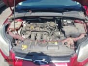 ✅ 2014 Ford Focus Titanium • VIN: 1FADP3N24EL158443 • Lot: 42801477. Listed on IAAI with 116,859 mi. Free auction sales archive from the USA and detailed vehicle history report at DreamBid. Image 10.