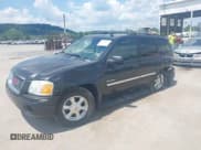 ✅ 2006 GMC Envoy SLE • VIN: 1GKDT13S662184583 • Lot: 42822019. Listed on IAAI with 152,023 mi. Free auction sales archive from the USA and detailed vehicle history report at DreamBid. Image 2.