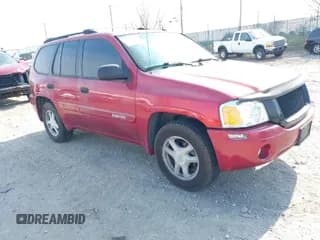 ✅ 2004 GMC Envoy SLE • VIN: 1GKDT13S442157704 • Lot: 41907592. Listed on IAAI with 127,000 mi. Free auction sales archive from the USA and detailed vehicle history report at DreamBid. Image 1.