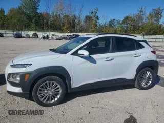 ✅ 2018 Hyundai Kona SEL • VIN: KM8K6CAA7JU082217 • Лот: 81633515. Опубликован ранее на Copart с пробегом 125 645 миль. Бесплатный доступ к архиву аукционных продаж из США и подробный отчёт об истории автомобиля на DreamBid. Изображение 1.