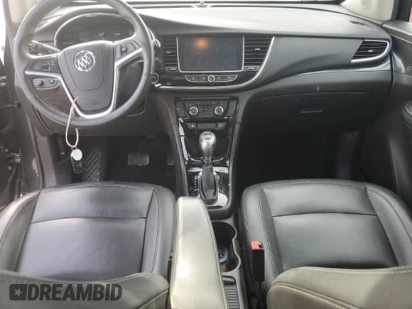 ✅ 2018 Buick Encore Essence • VIN: KL4CJCSB3JB560492 • Лот: 80815405. Опубликован ранее на Copart с пробегом 116 170 миль. Бесплатный доступ к архиву аукционных продаж из США и подробный отчёт об истории автомобиля на DreamBid. Изображение 8.