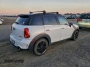 ✅ 2012 MINI Countryman S • VIN: WMWZC5C55CWL55926 • Lot: 94138955. Listed on Copart with 141,658 mi. Free auction sales archive from the USA and detailed vehicle history report at DreamBid. Image 3.