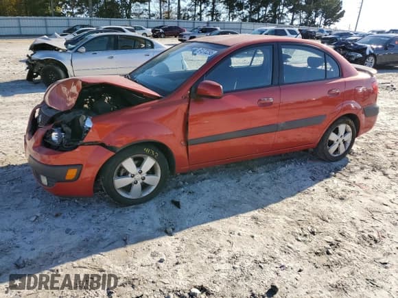 ✅ 2008 Kia Rio LX • VIN: KNADE123486333310 • Лот: 91370295. Опубликован ранее на Copart с пробегом 127 115 миль. Бесплатный доступ к архиву аукционных продаж из США и подробный отчёт об истории автомобиля на DreamBid. Изображение 1.