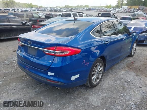 ✅ 2017 Ford Fusion SE • VIN: 3FA6P0PUXHR354432 • Lot: 42721594. Listed on IAAI with 136,264 mi. Free auction sales archive from the USA and detailed vehicle history report at DreamBid. Image 4.