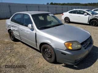 2003 Hyundai Accent GL z VIN KMHCG45CX3U474856, wystawiony jako Copart lot #67615445 z przebiegiem 205 400 mil mil oraz Szkoda całkowita • Salvage title. Historia ofert i sprzedaży dostępna na DreamBid. Obrazek 4.