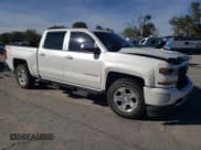 ✅ 2018 Chevrolet Silverado 1500 LT • VIN: 3GCUKREC7JG124119 • Lot: 89725465. Wystawiony na Copart z przebiegiem 111 091 mil. Bezpłatny archiwum sprzedaży aukcyjnych z USA i szczegółowy raport historii pojazdu na DreamBid. Zdjęcie 4.