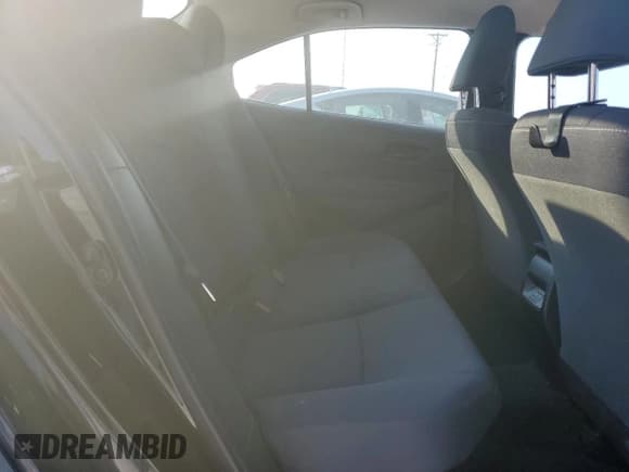 ✅ 2023 Toyota Corolla Hybrid LE • VIN: JTDBDMHE1P3001249 • Лот: 71884565. Опубликован ранее на Copart с пробегом 53 569 миль. Бесплатный доступ к архиву аукционных продаж из США и подробный отчёт об истории автомобиля на DreamBid. Изображение 10.