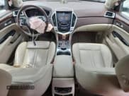 ✅ 2016 Cadillac SRX Premium Collection • VIN: 3GYFNDE39GS546265 • Lot: 65597945. Wystawiony na Copart z przebiegiem 145 591 mil. Bezpłatny archiwum sprzedaży aukcyjnych z USA i szczegółowy raport historii pojazdu na DreamBid. Zdjęcie 8.